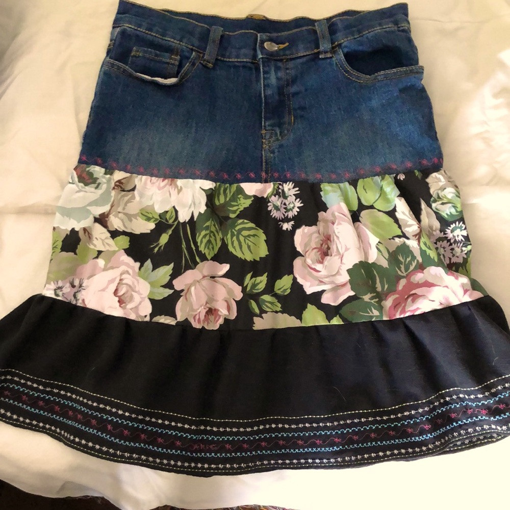 This custom made skirt is 20” long and 27” waist.